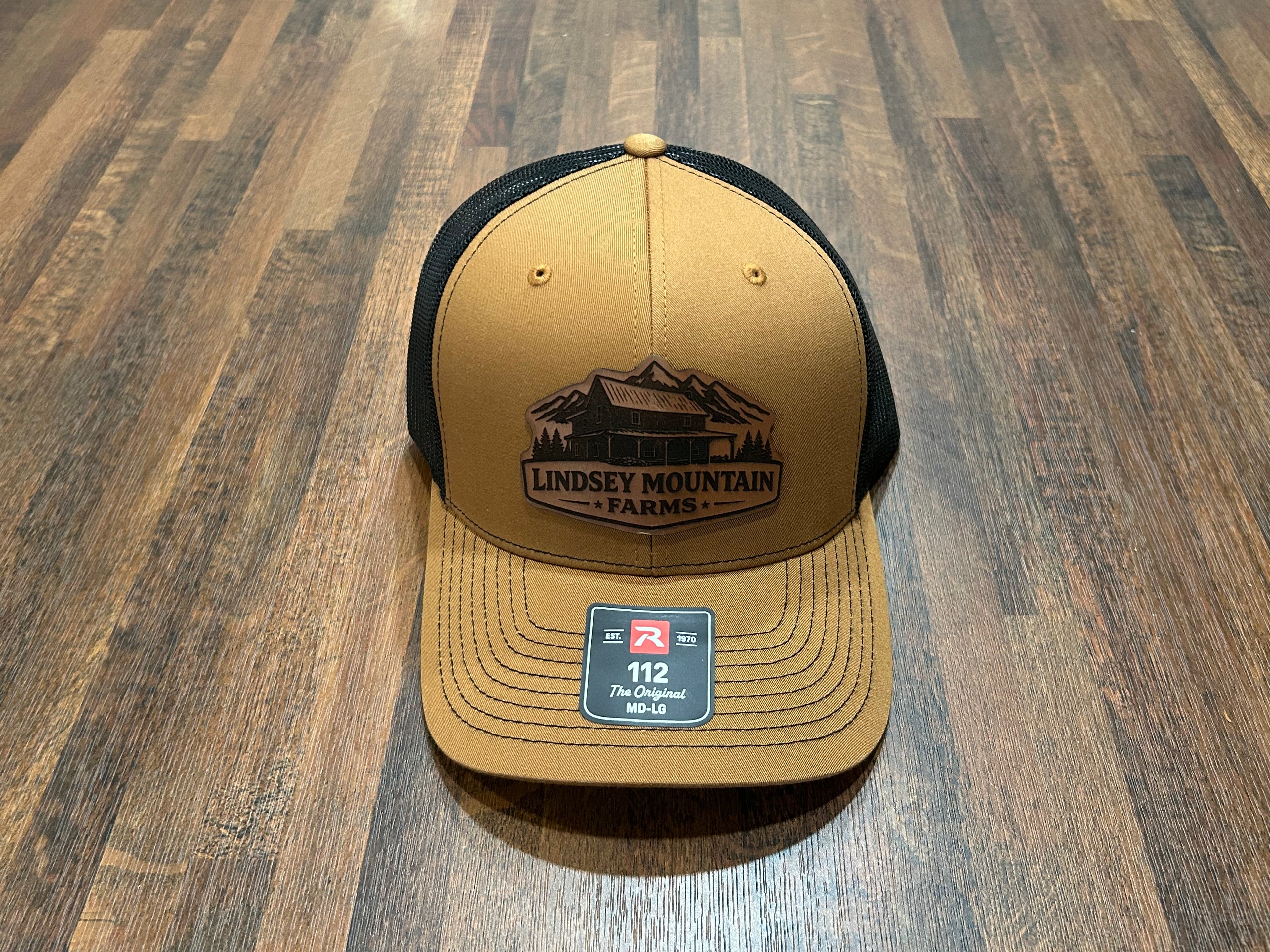 Lindsey Mountain Farms Leather Patch Trucker Hat – Carmel/Black Richardson 112